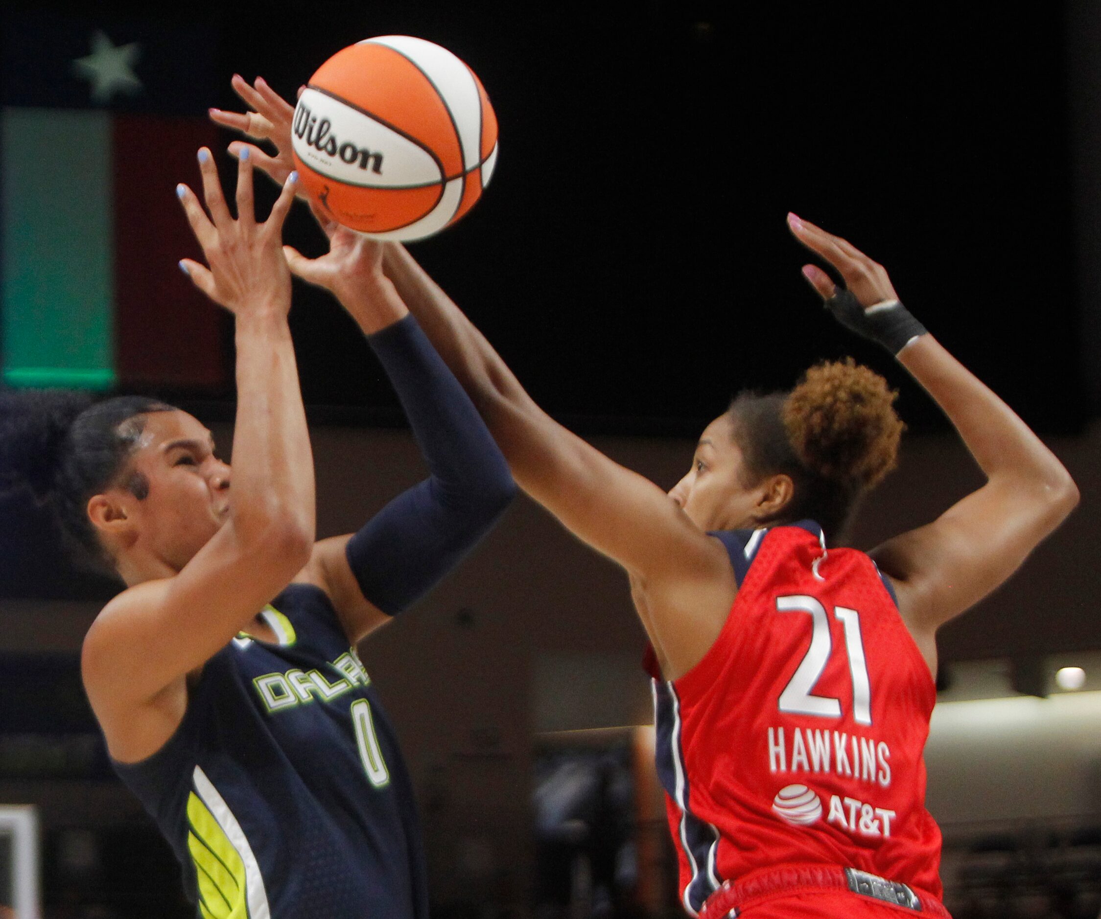 Dallas Wings forward Satou Sabally (0) is fouled by Washington Mystics forward Tianna...