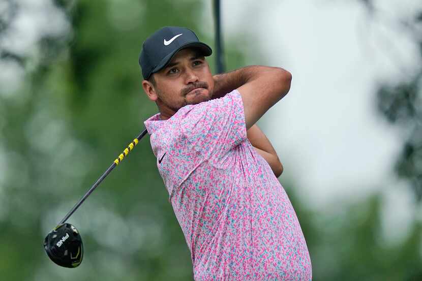 Jason Day, of Australia, hits a tee shot on the second hole during the final round of the...