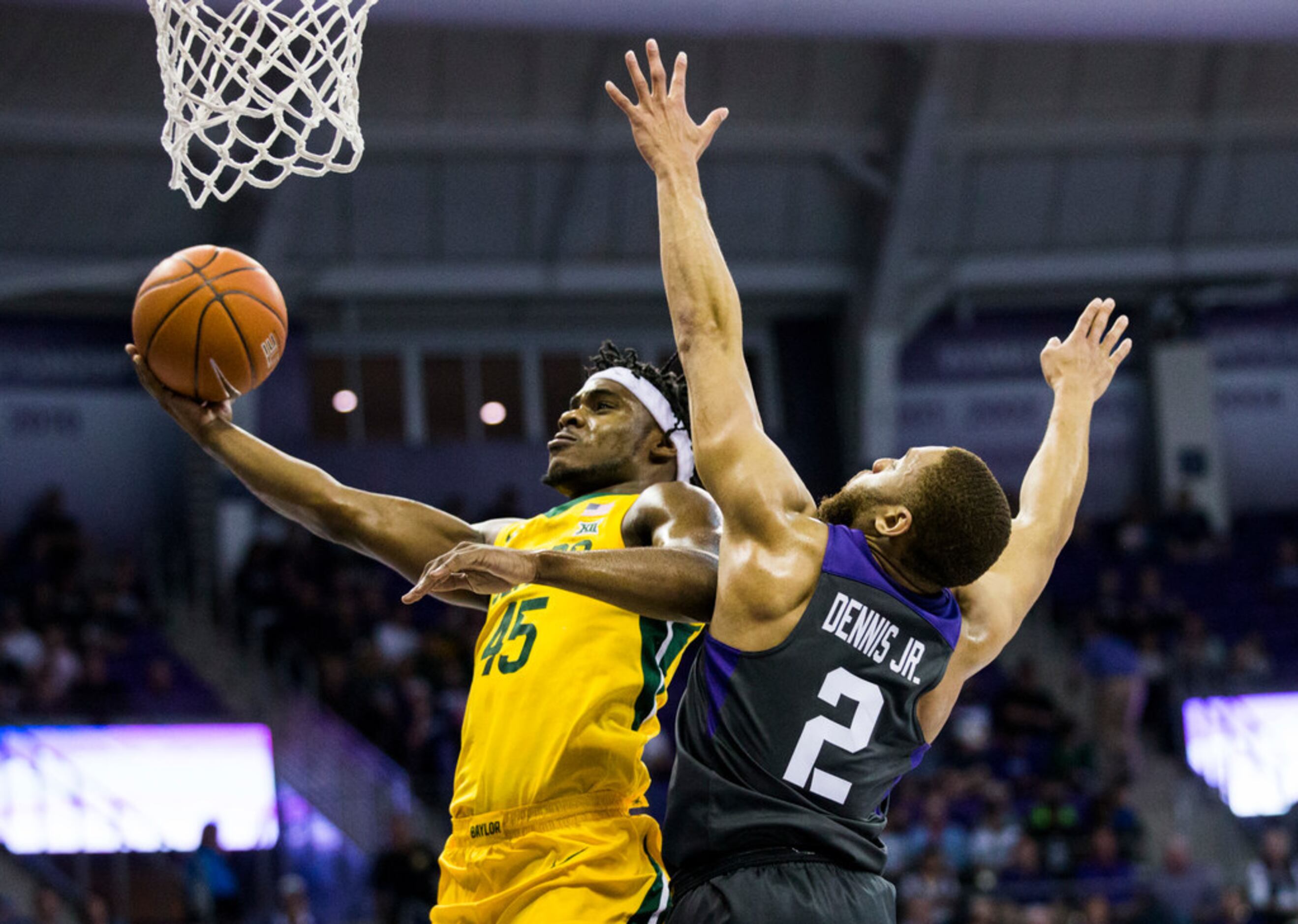 Baylor Bears guard Davion Mitchell (45) goes up for a shot ahead of TCU Horned Frogs guard...