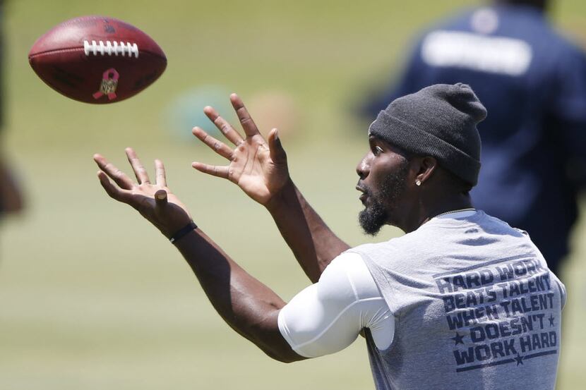 Dallas Cowboys wide receiver Dez Bryant prepares to catch the ball during rookie minicamp at...