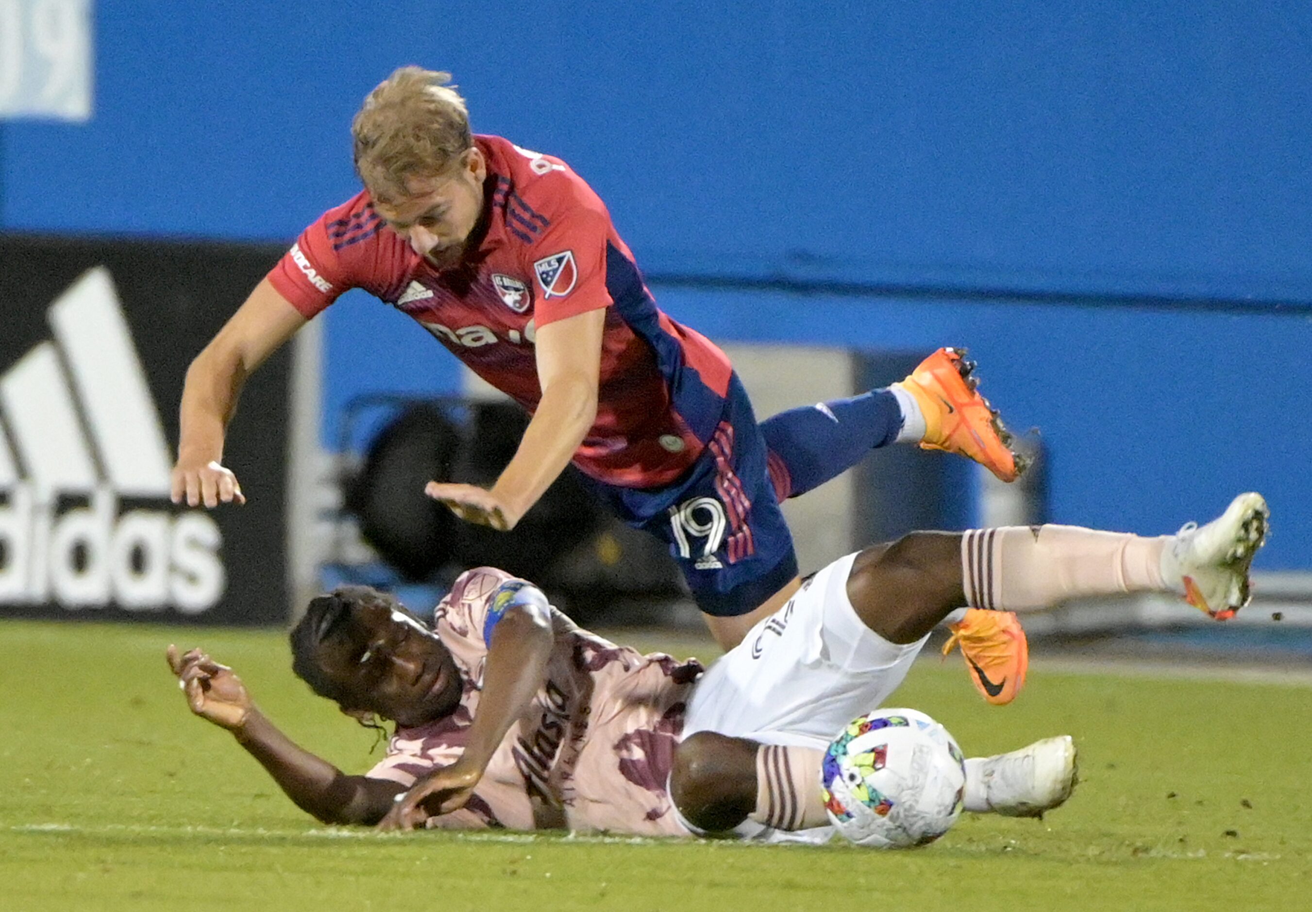 FC Dallas midfielder Paxton Pomykal (19) is fouled by Portland Timbers midfielder Diego...