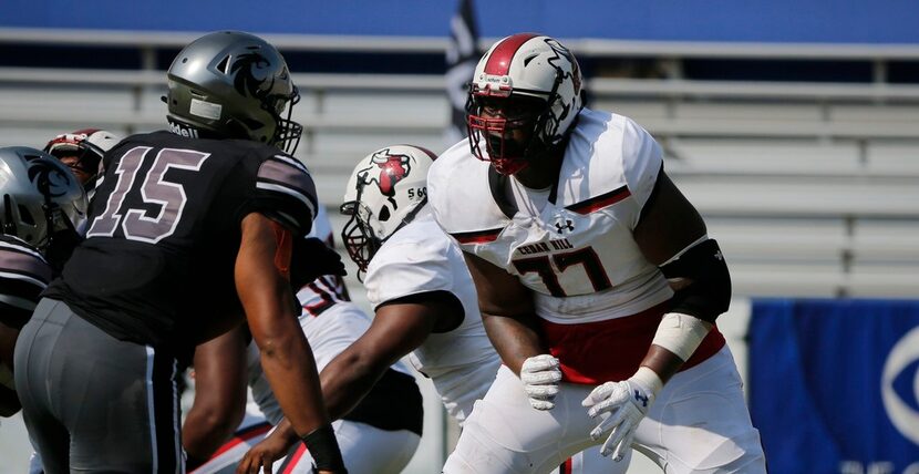 Cedar Hill offensive tackle Courtland Ford plays against Denton Guyer during the first half...