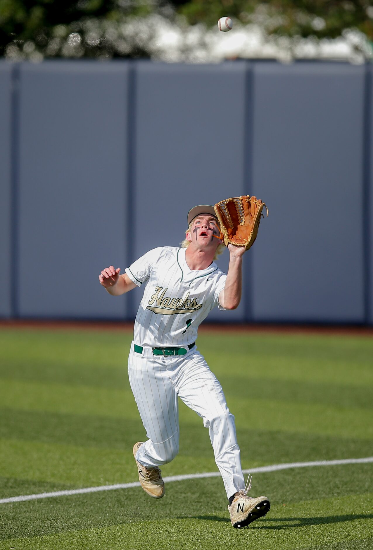 Birdville’s Payton Brooks (1) catches a pop foul hit by Mansfield Legacy’s Griffin Binkley...