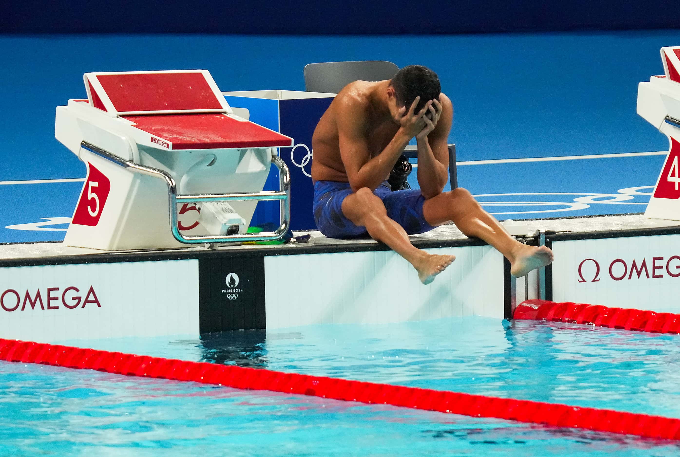 Guilherme Costa of Brazil reacts to finishing fifth in the men's 400-meter freestyle final...
