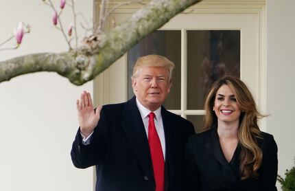 President Donald Trump with Hope Hicks in March