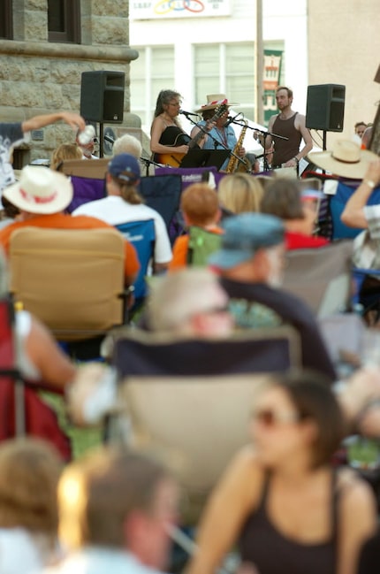 Lisa Markley and the Ne'er-Do-Wells played at Twilight Tunes on the Square in 2012 in Denton.  