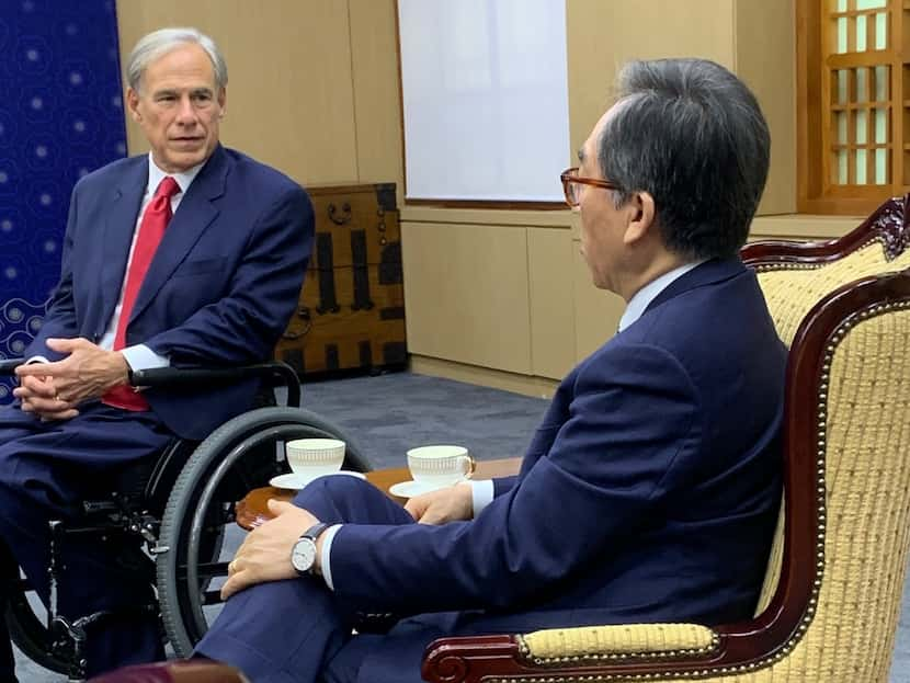 Texas Gov. Greg Abbott and South Korean Foreign Affairs Minister Cho Tai-yul speak during a...