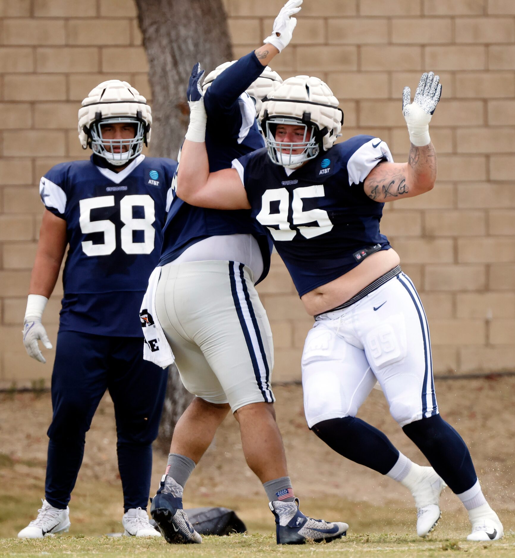 Dallas Cowboys rookie defensive tackle John Ridgeway (95) runs a pass rush drill during...