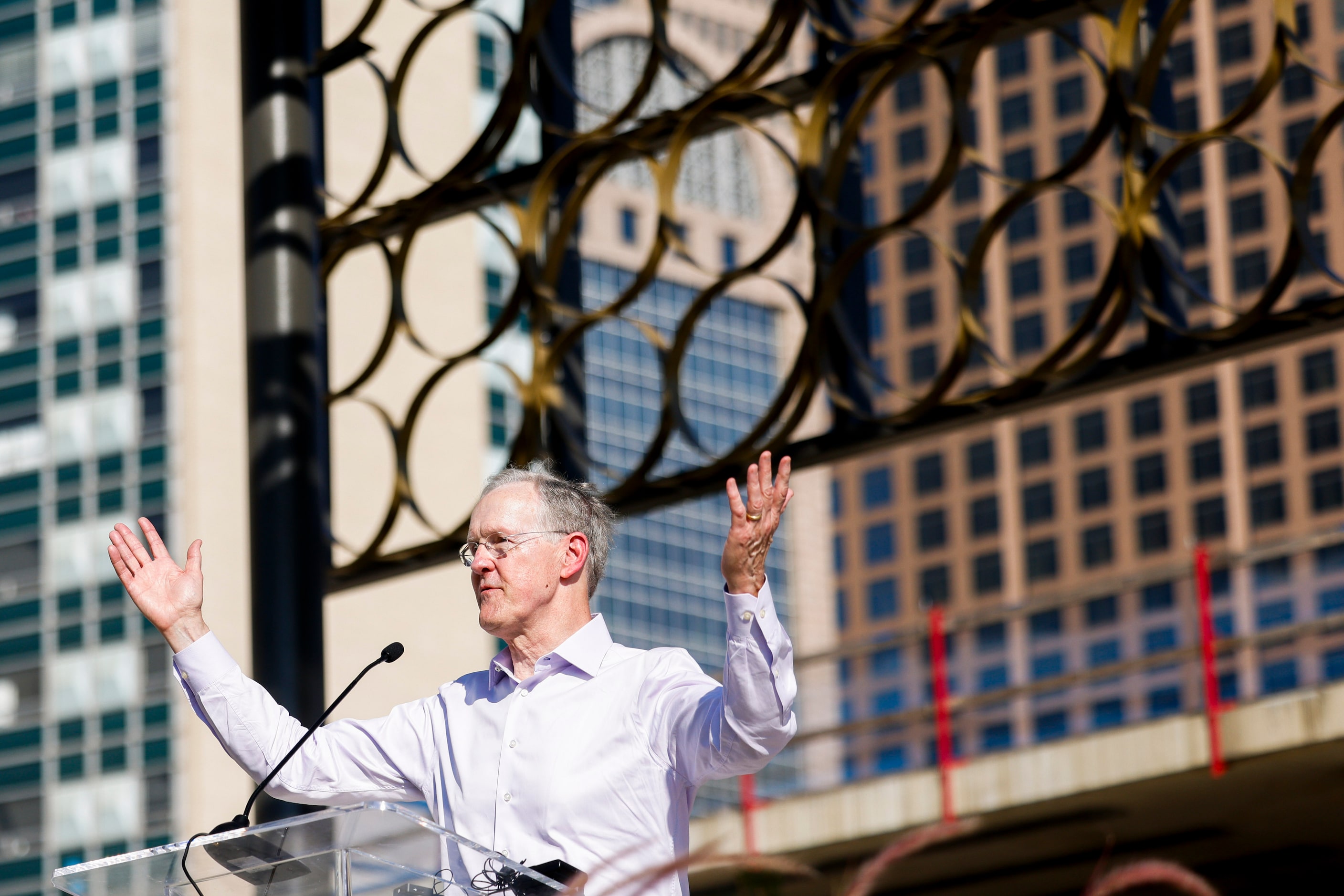 Downtown Dallas Parks Conservancy chairman, Robert Decherd, speaks during the opening...