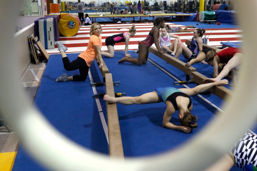 Kim Zmeskal, left, retired artistic gymnast, who was a national champion, world champion,...