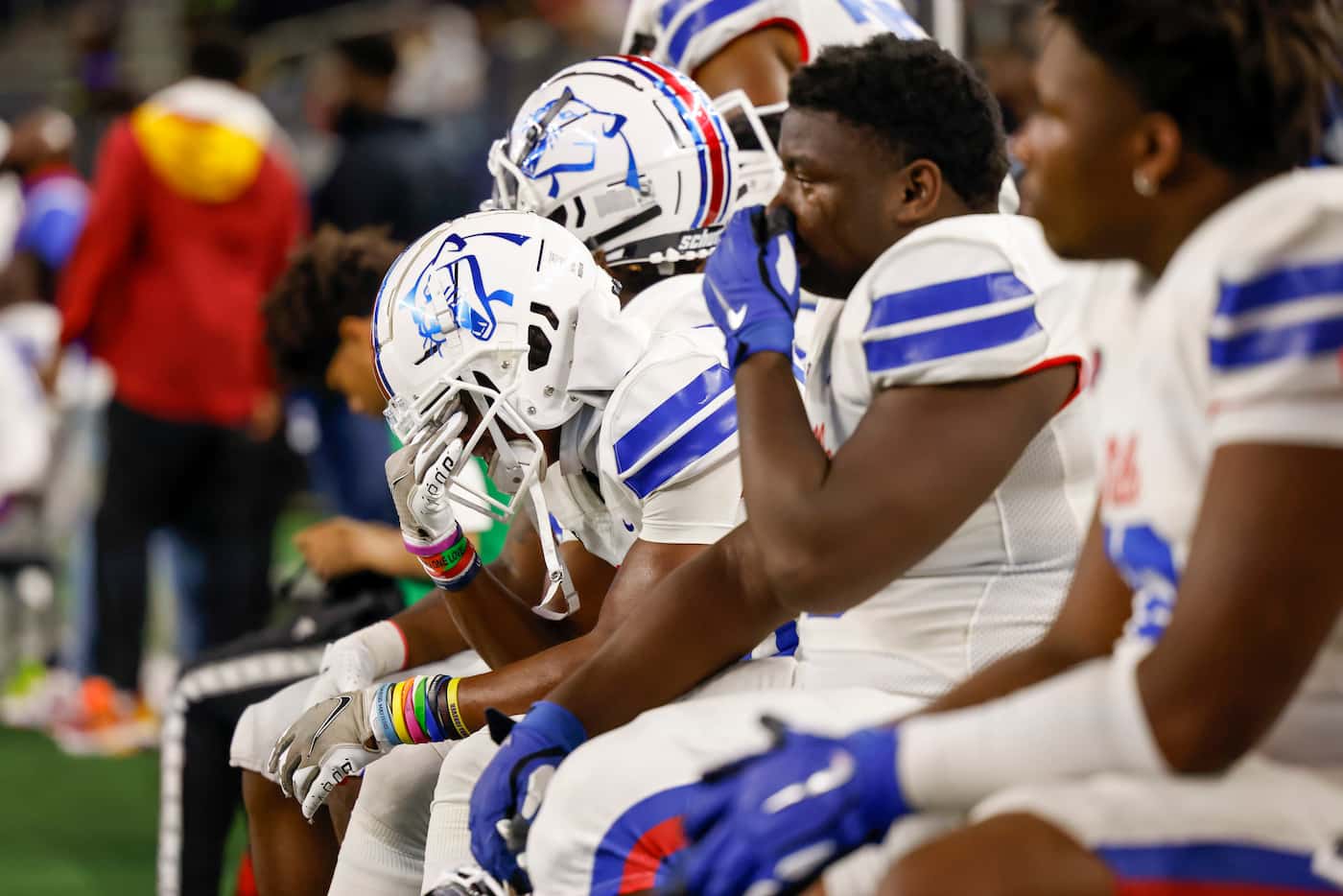 Duncanville players react on the sidelines during the closing seconds of their Class 6A...