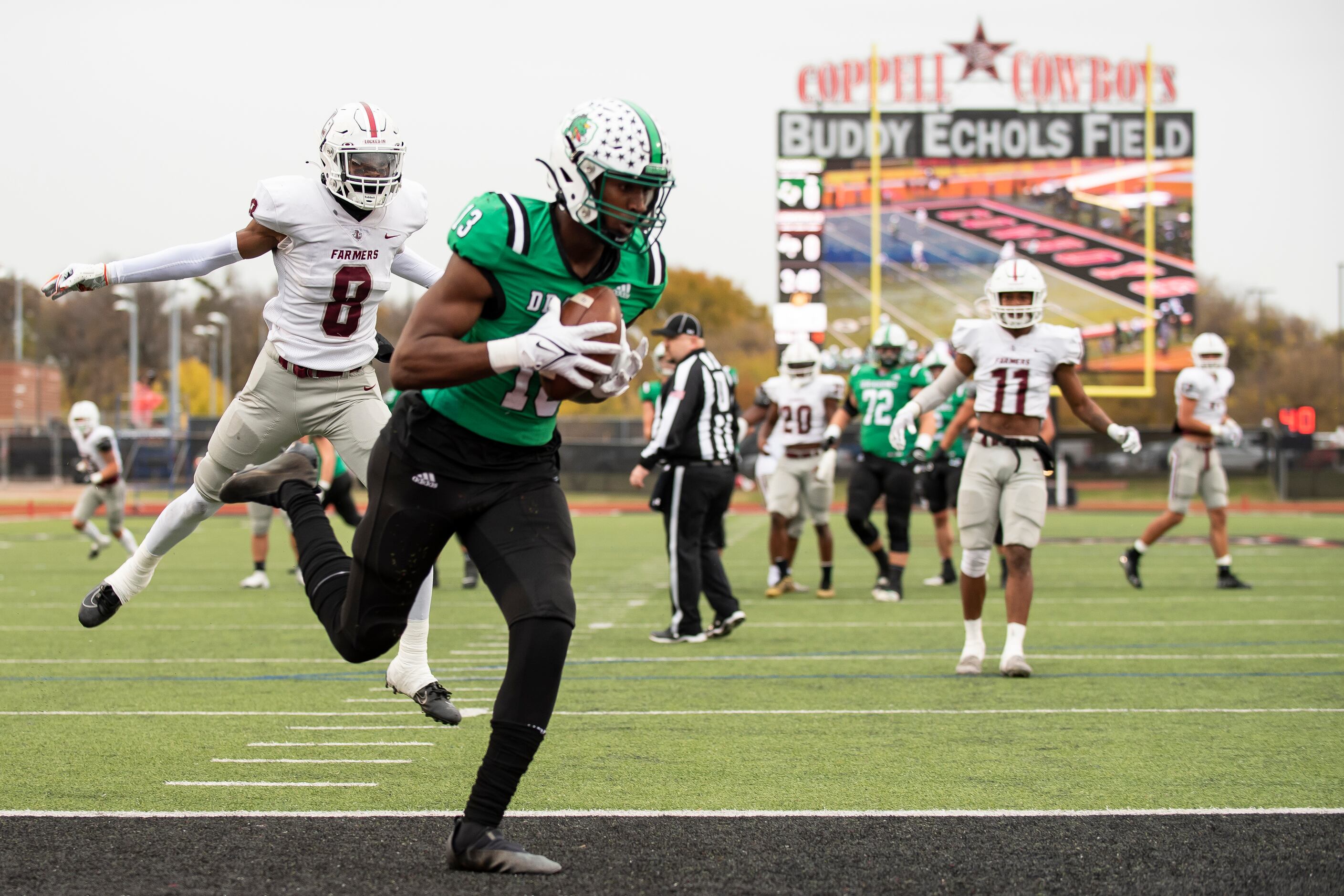 Southlake Carroll senior RJ Maryland (13) catches a touchdown pass during the Class 6A...