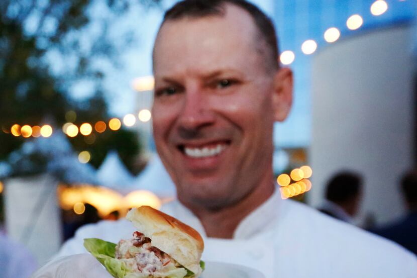 Jim Oetting, Executive Chef at Victory Tavern, shows off his Lobster BLT Slider, offered at...