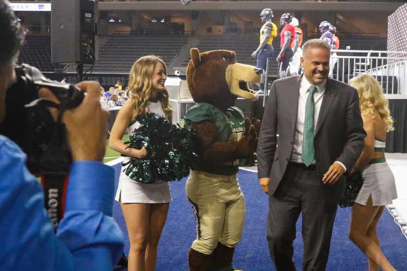 Matt Rhule, head football coach at Baylor, laughs after a photo opp with the Baylor Bears...