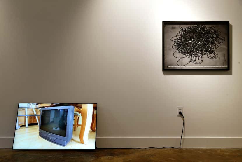 Artist Penelope Umbrico's piece Pirouette for CRT (left), a 2012, Single channel digital...