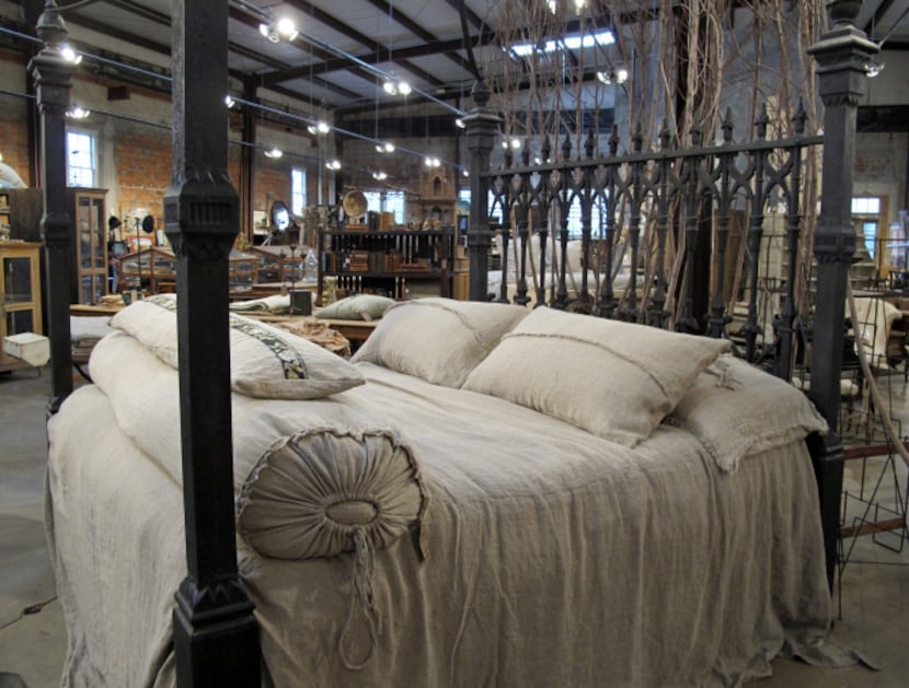 Carol Hicks Bolton Antiquites in Fredericksburg, is known for its antique beds and fine linens.