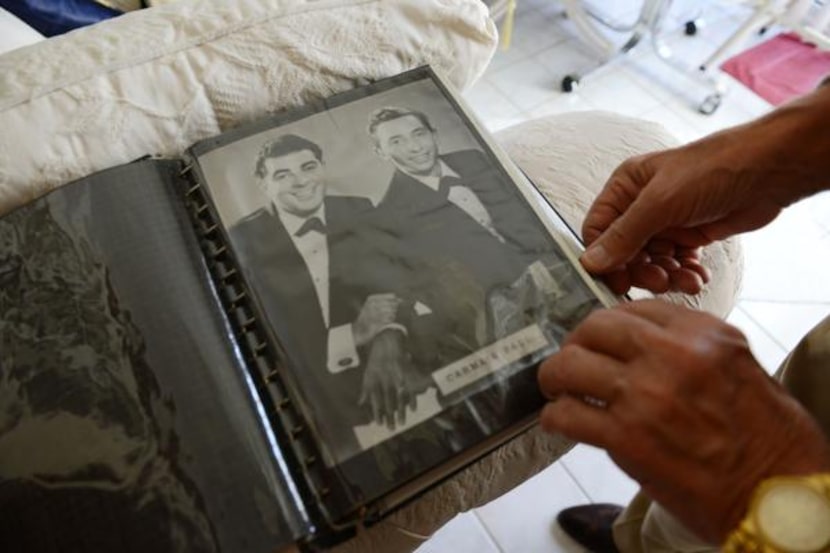 
Paul Salos (left) of Garland and Carme Pitrello had a sideshow act that offered...