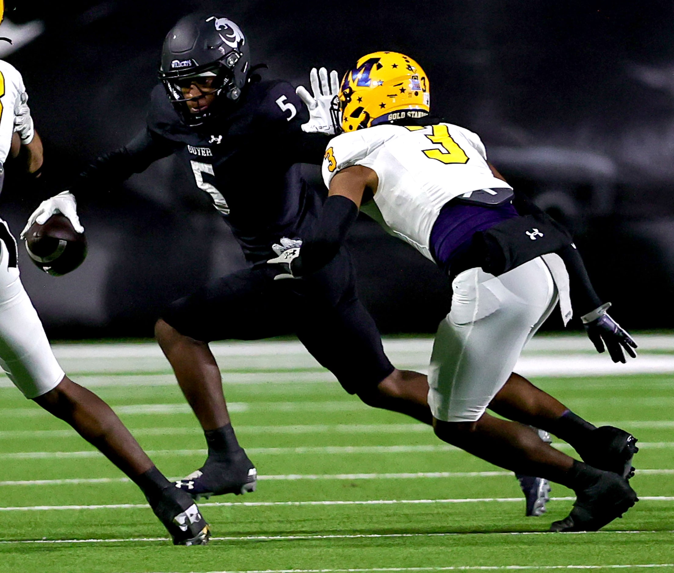 Denton Guyer wide receiver DJ Reese (5) tries to avoid McKinney linebacker Jeremiah Sowe (3)...