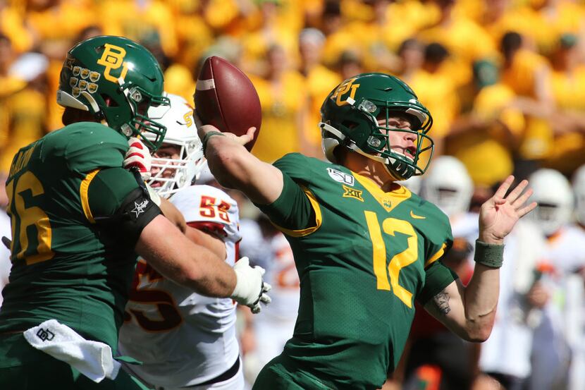 Baylor quarterback Charlie Brewer throws downfield against Iowa State in the first half of...