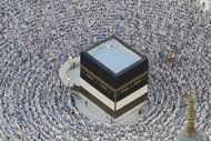Muslim pilgrims circumambulate the Kaaba, the cubic building at the Grand Mosque, during the...
