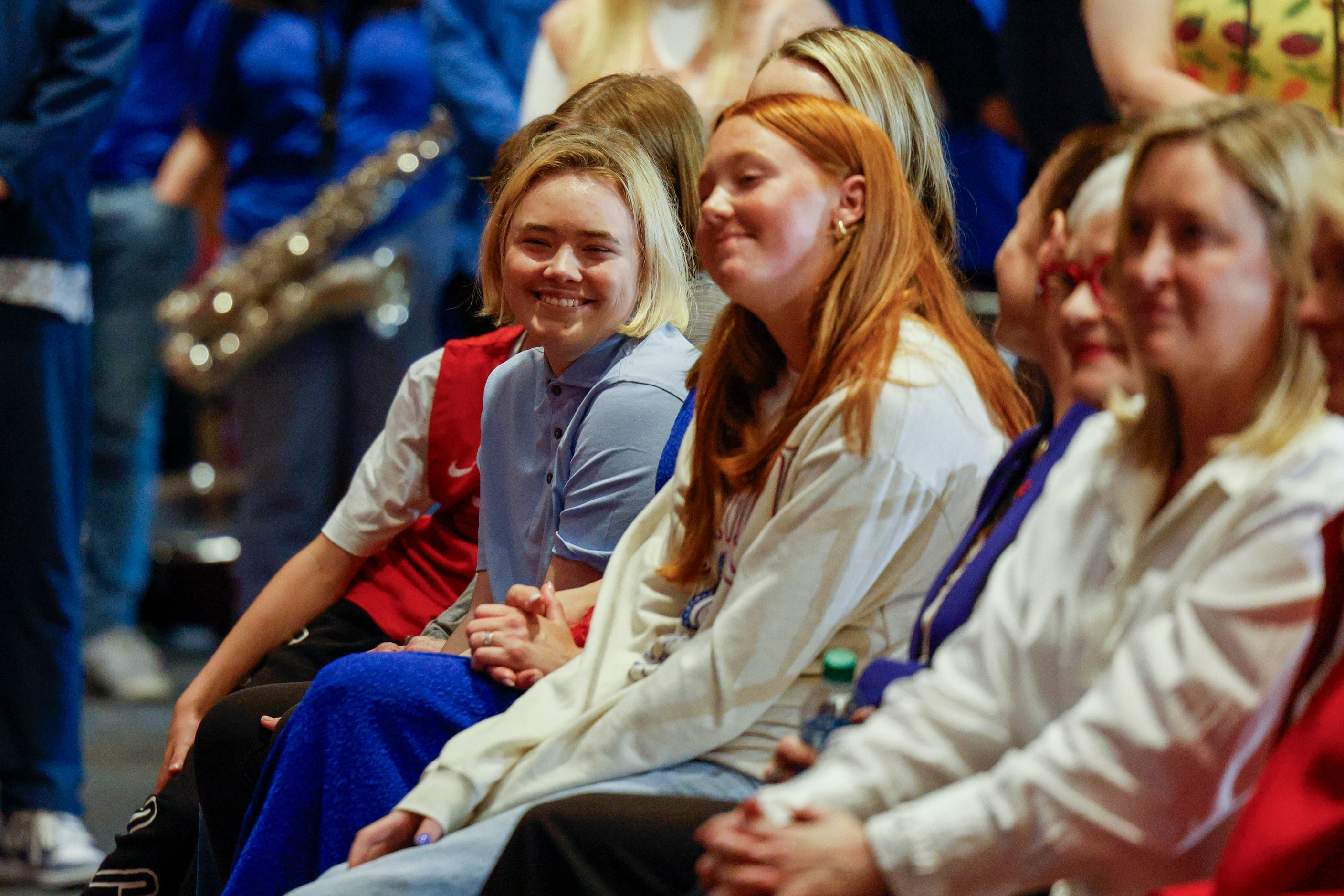 SMU head men's basketball coach Andy Enfield’s daughters Aila (left) and Lily (second from...