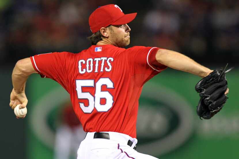 Texas relief pitcher Neal Cotts is pictured during the Toronto Blue Jays vs. the Texas...