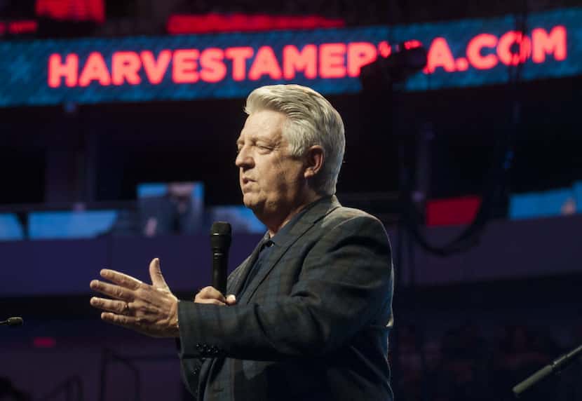 Jack Graham, pastor of Prestonwood Baptist Church, leads a prayer during Harvest America at...