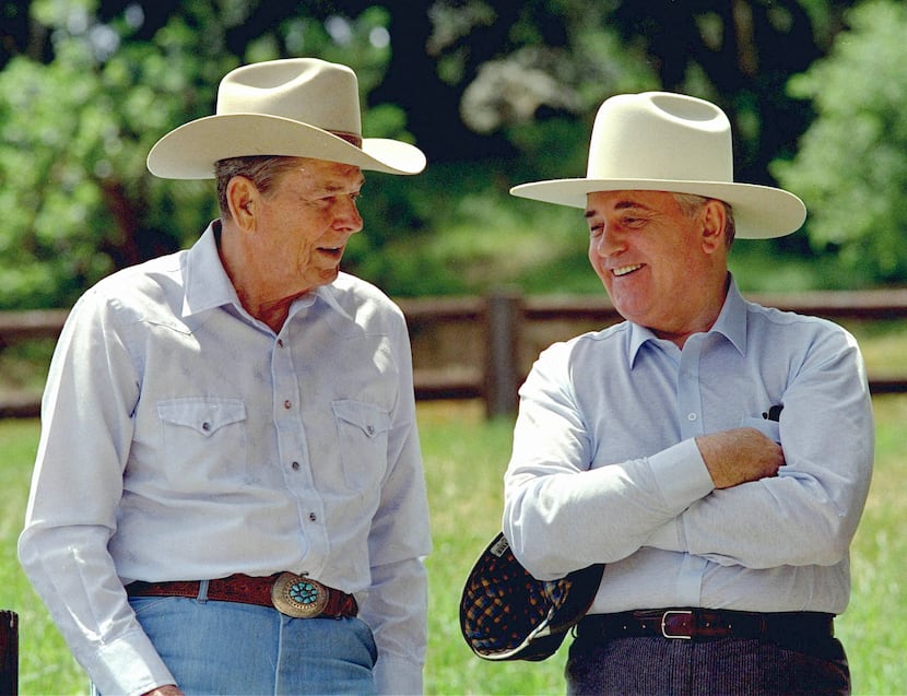 Former President Ronald Reagan (left) and former Soviet President Mikhail Gorbachev donned...