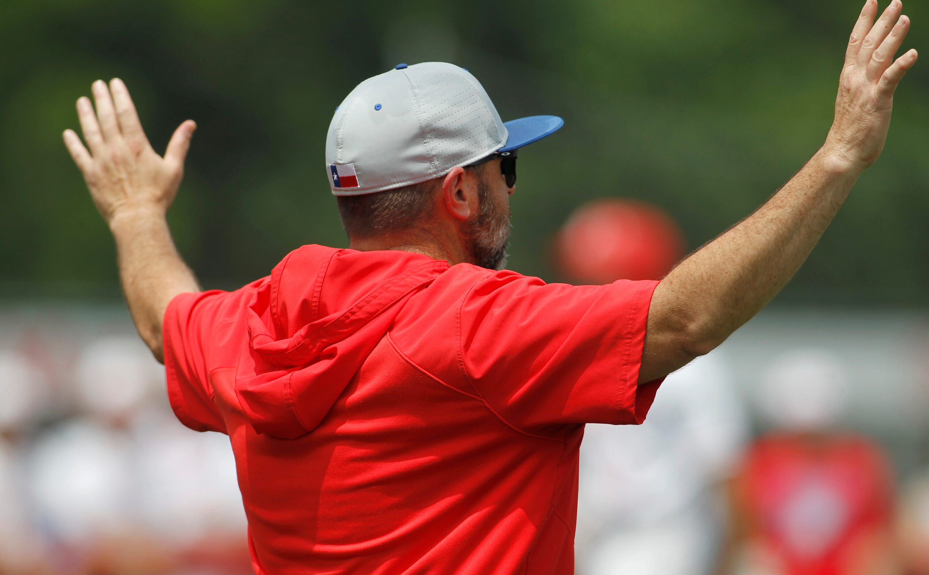 Midlothian Heritage head coach Nick Junior argues an umpire's call during their game against...