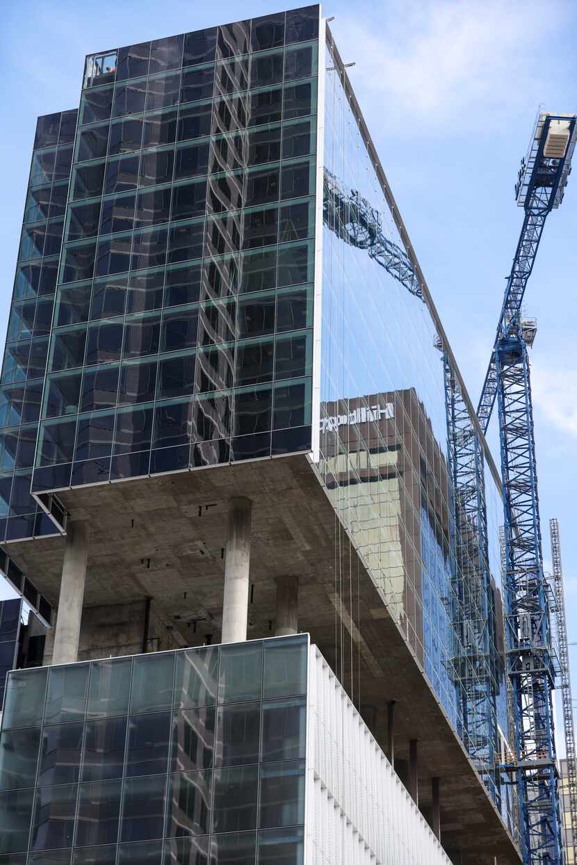 The new JW Marriott Hotel in downtown Dallas is being built on top of a 10-story parking...