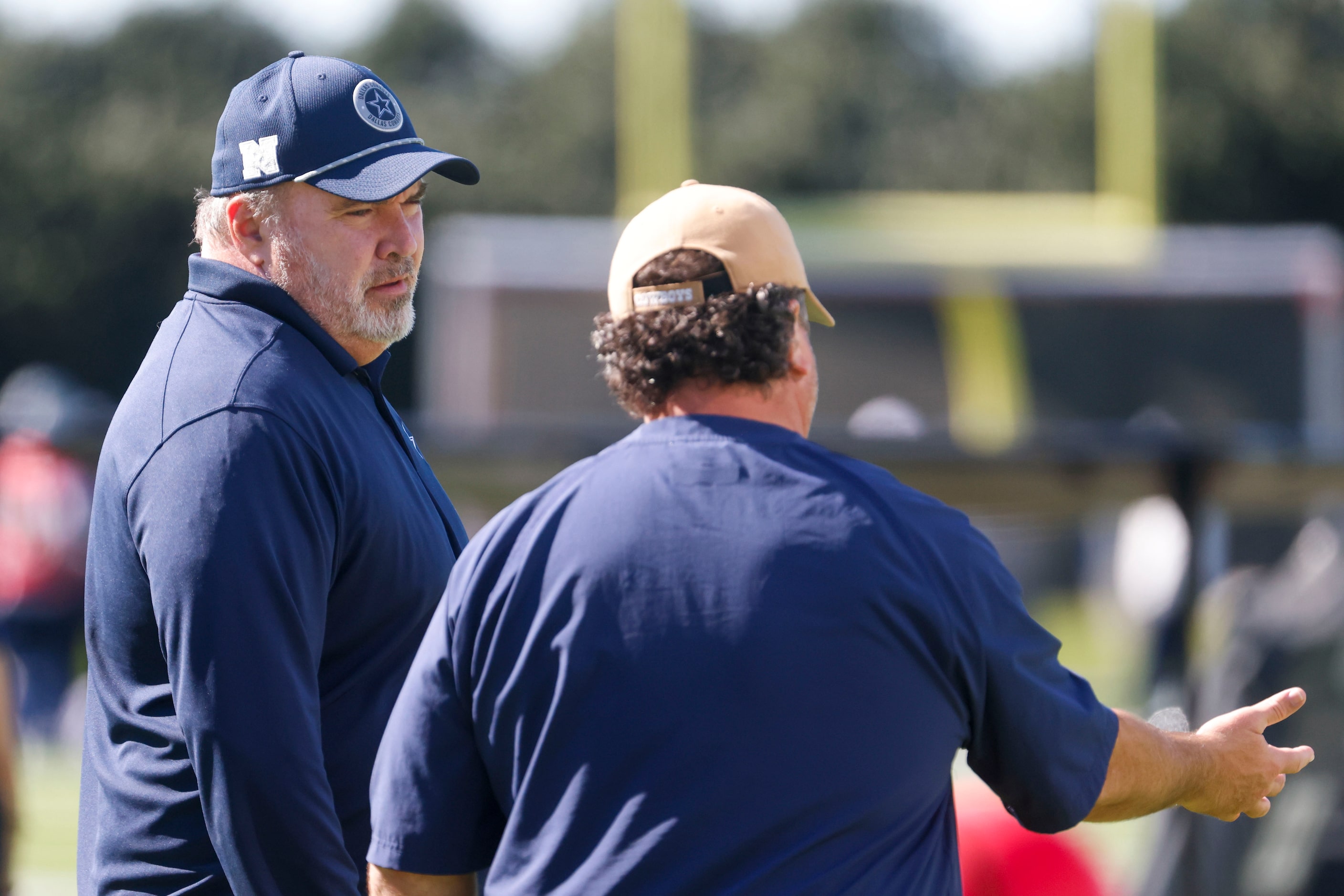 Dallas Cowboys head coach Mike McCarthy remains in the sideline during a team practice on...