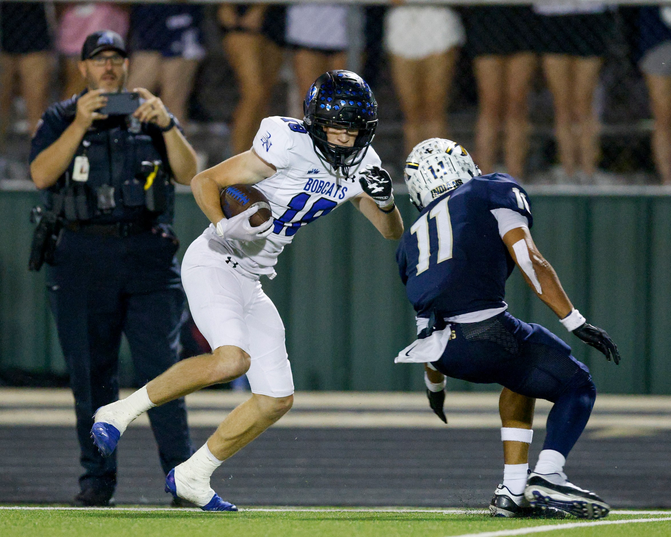 Trophy Club Byron wide receiver Nelson Kurt Ippolito (18) cuts inside after making a catch...