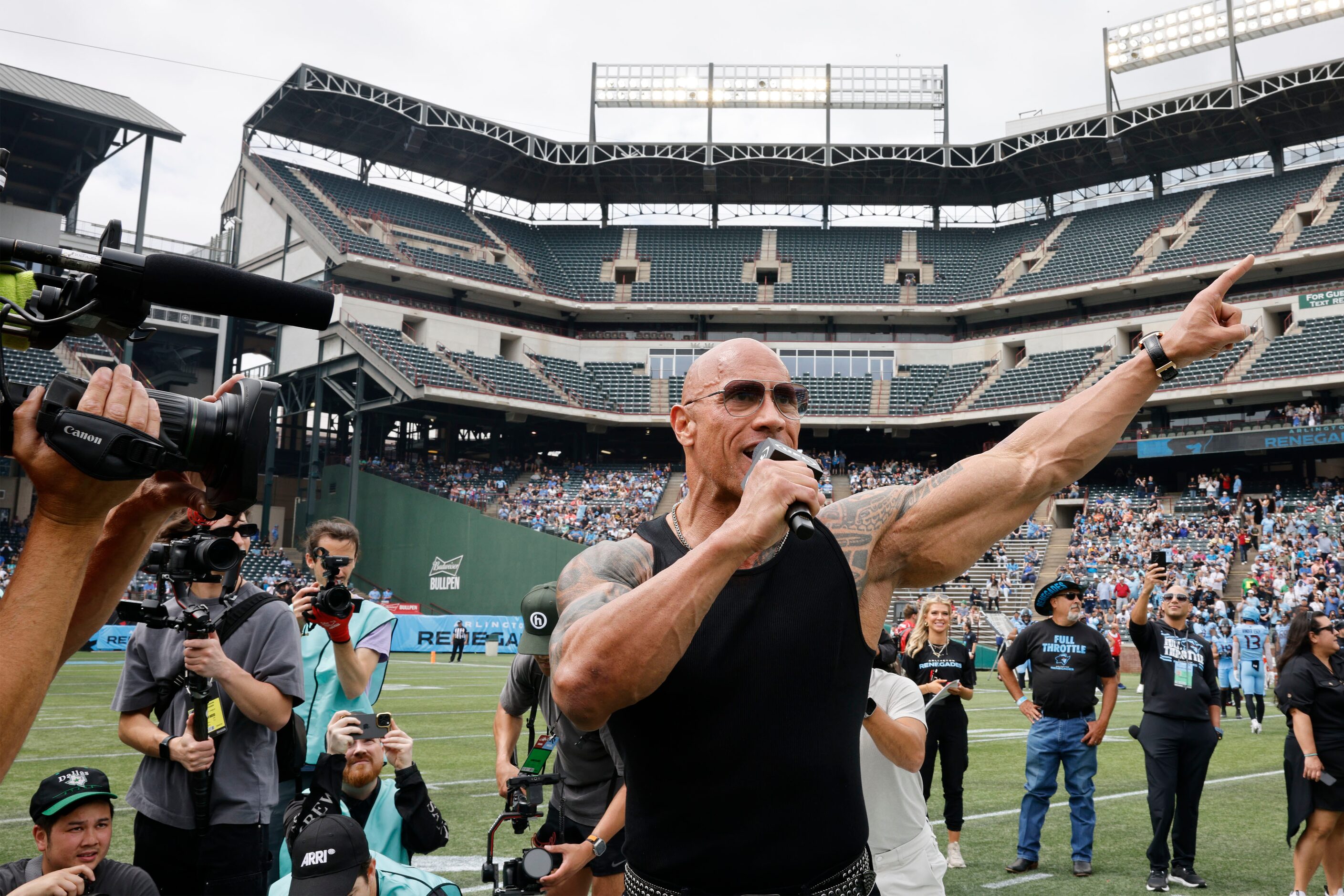 Dwayne "The Rock" Johnson speaks  before a football game between the Arlington Renegades and...