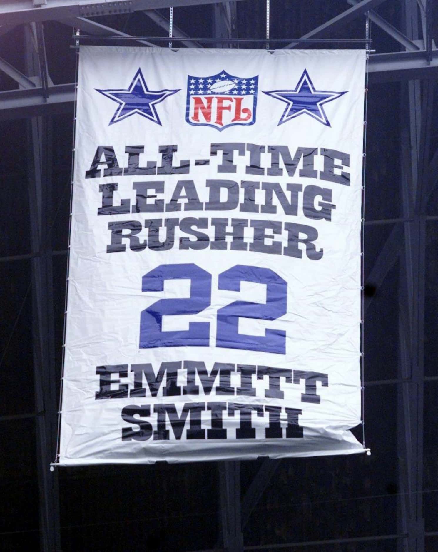 A banner for Emmitt Smith was lowered from the Texas Stadium rafters after he became the NFL...