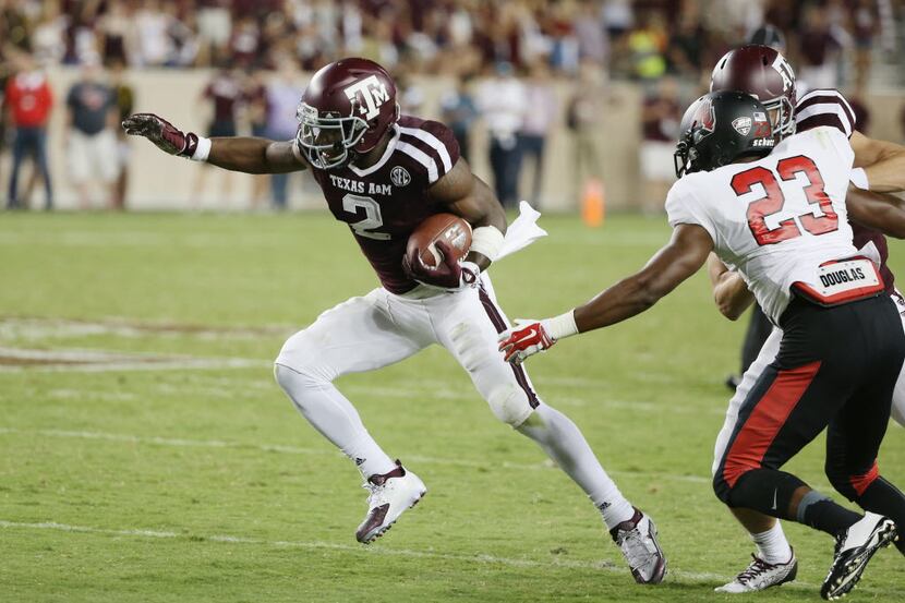 COLLEGE STATION, TX - SEPTEMBER 12:  Speedy Noil #2 of the Texas A&M Aggies runs with the...