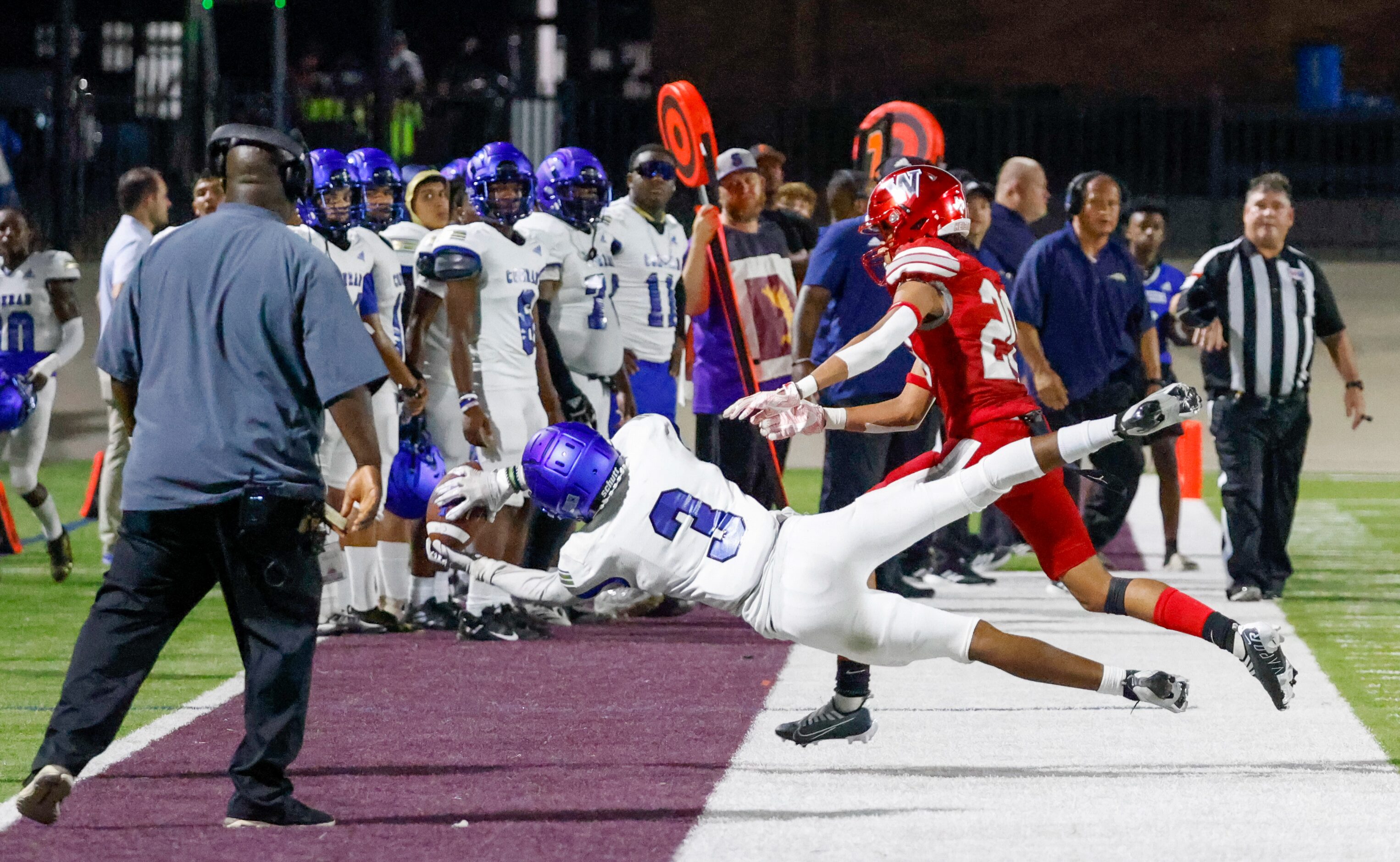 Conrad wide receiver DeAnthony Flagge (3) dives for the ball during the first half of a game...