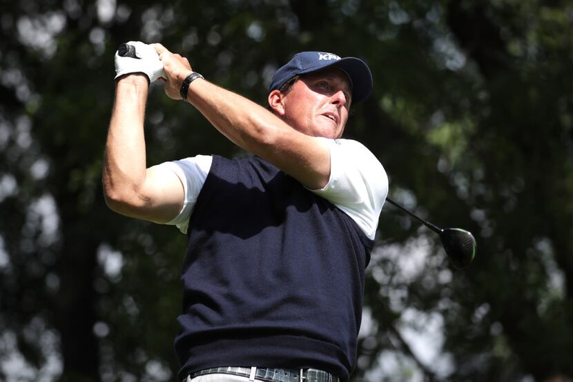 Phil Mickelson, who wasn't accused of wrongdoing, repaid $1 million that he made on Dean...