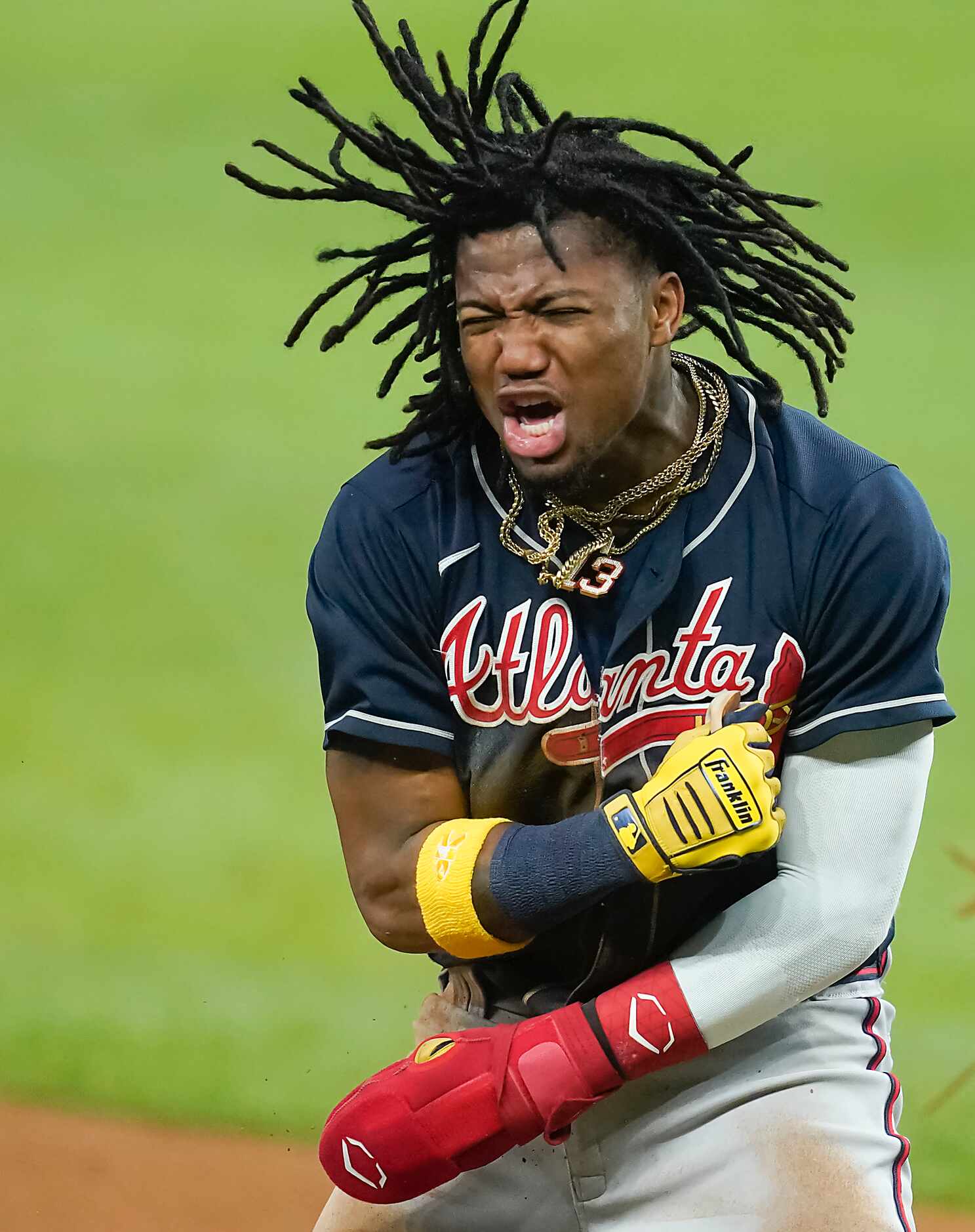 Atlanta Braves right fielder Ronald Acuna Jr. celebrates after advancing from first to third...