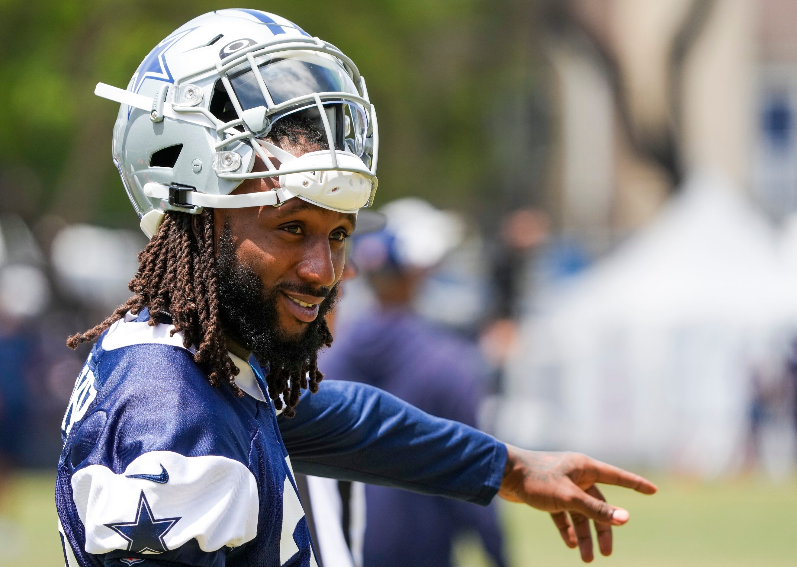 Dallas Cowboys safety Malik Hooker (28) motions from the sideline during a practice at...