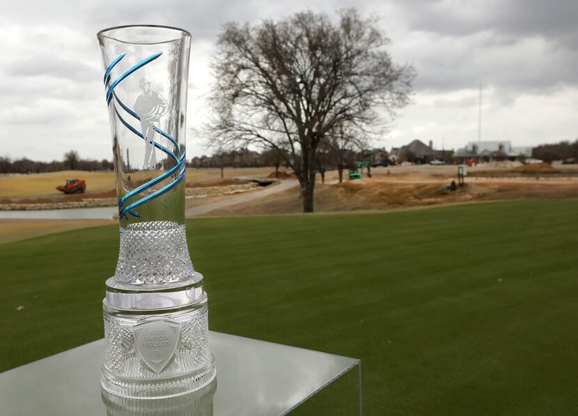 Workers prepare for the Byron Nelson tournament at TPC Craig Ranch in McKinney on March 9,...