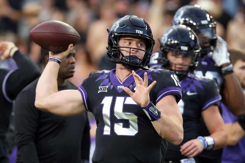 TCU quarterback Max Duggan (15) warms up before an NCAA college football game against Kansas...