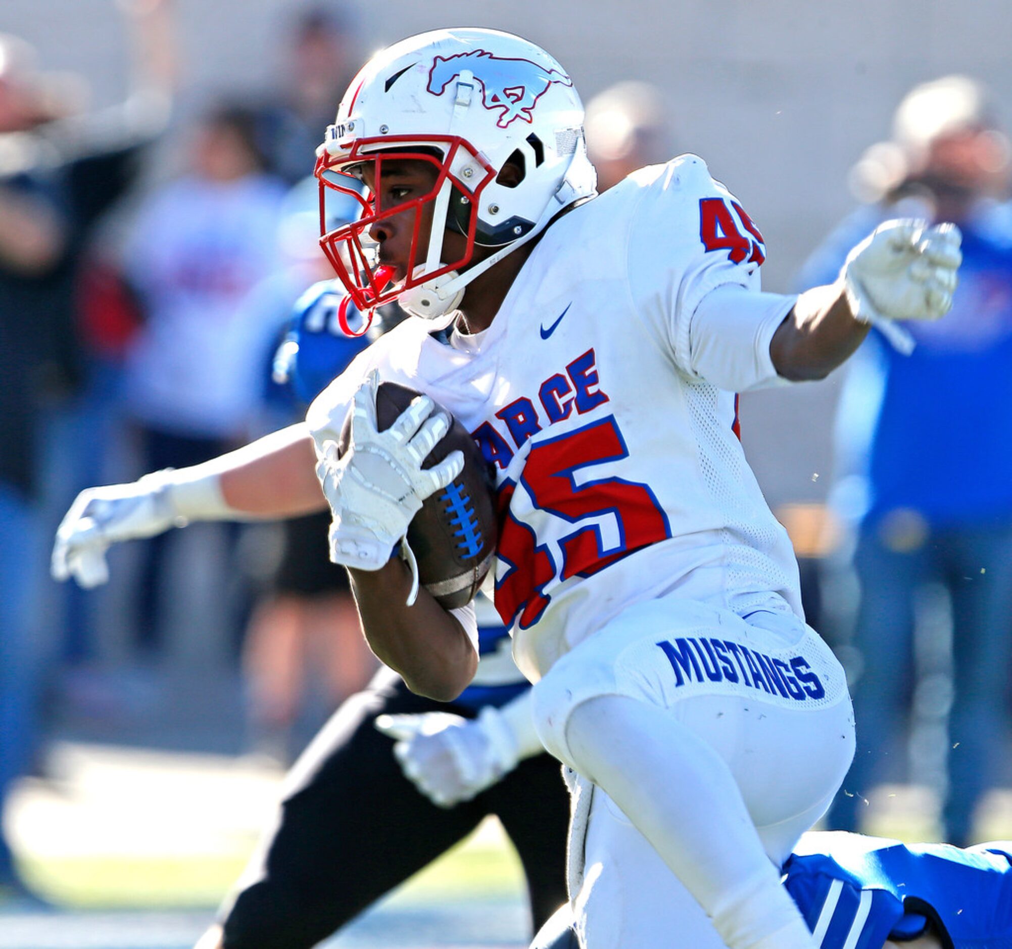 Pearce High School running back Dequan Landon (45) carries the football during the third...