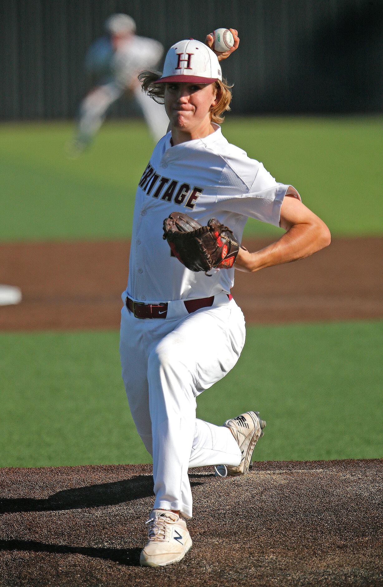 Heritage pitcher Bryce Gilchrist delivers a pitch in relief in the fourth inning as Frisco...