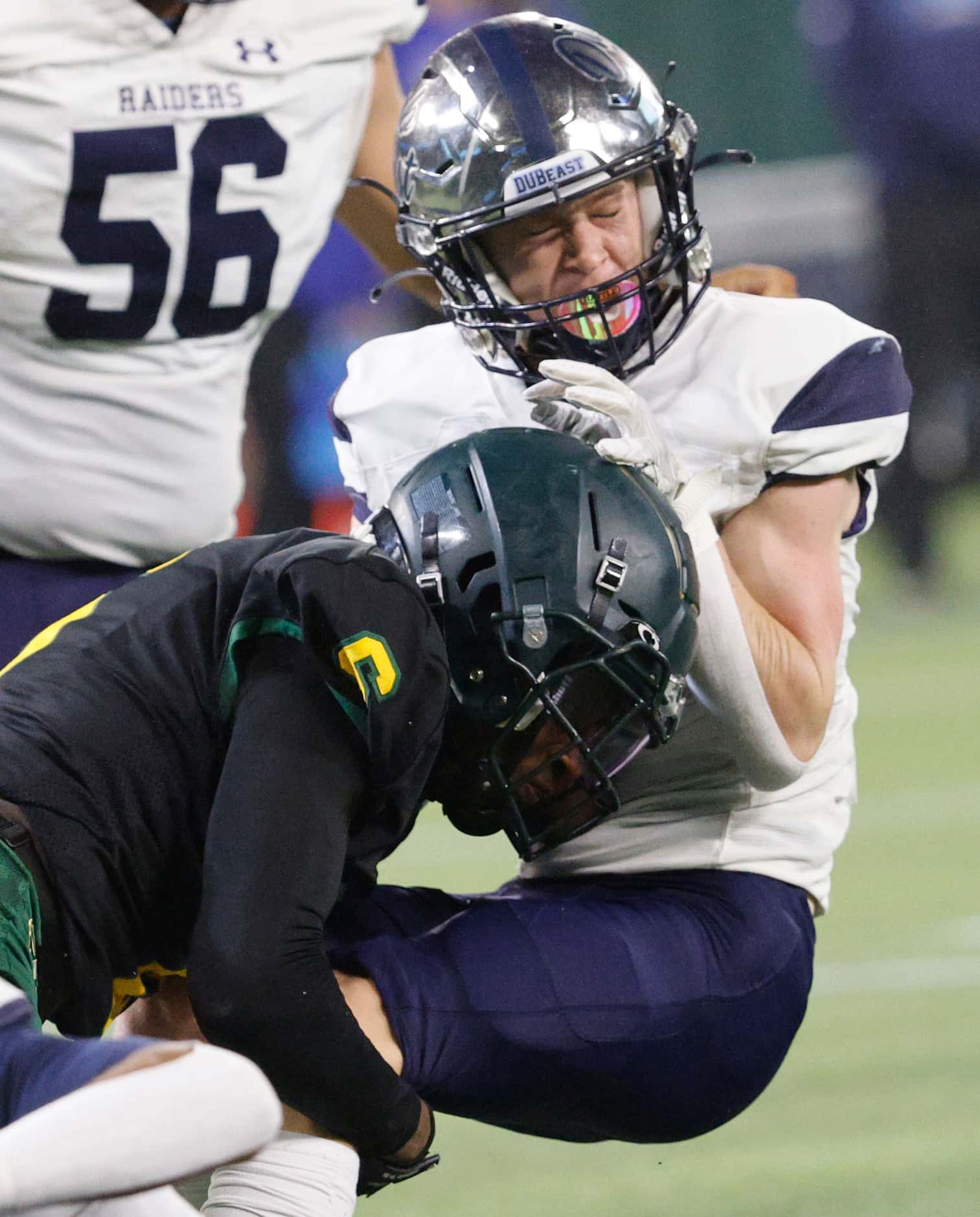 Wylie East's Kason Atkins (6), right, is tackled by DeSoto's Aundre Wisner (6) during the...