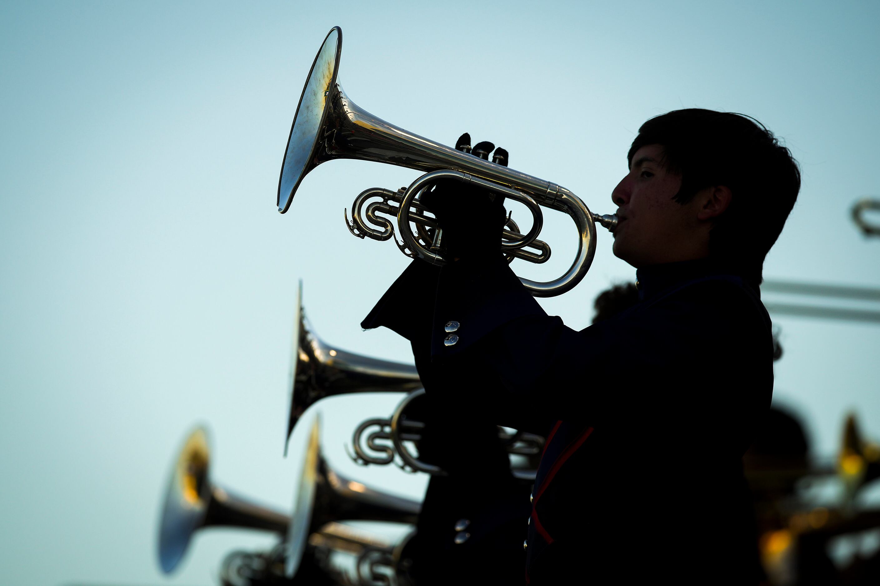 Members of the Denton Ryan band perform before a District 5-5A Division I high school...