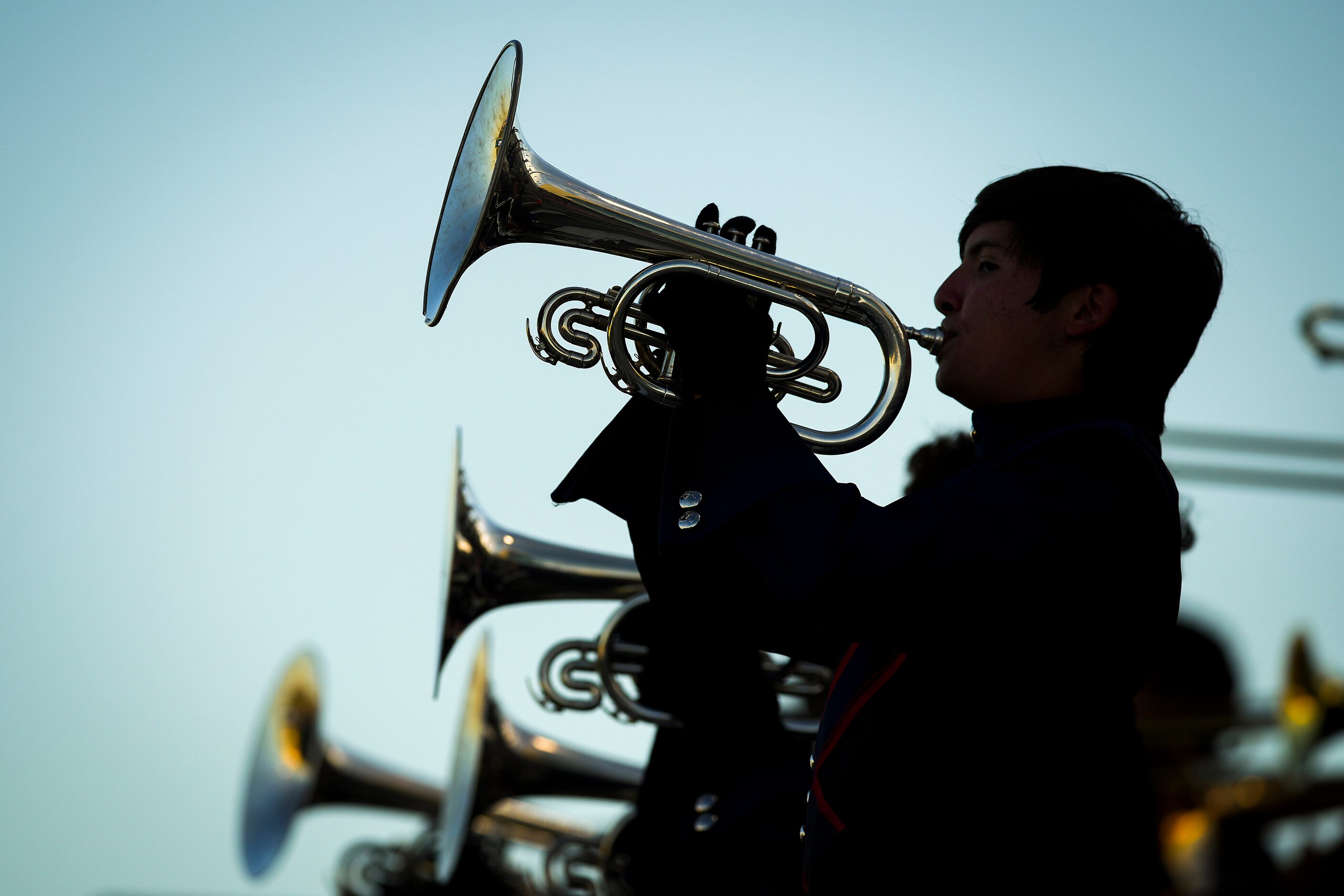 Members of the Denton Ryan band perform before a District 5-5A Division I high school...