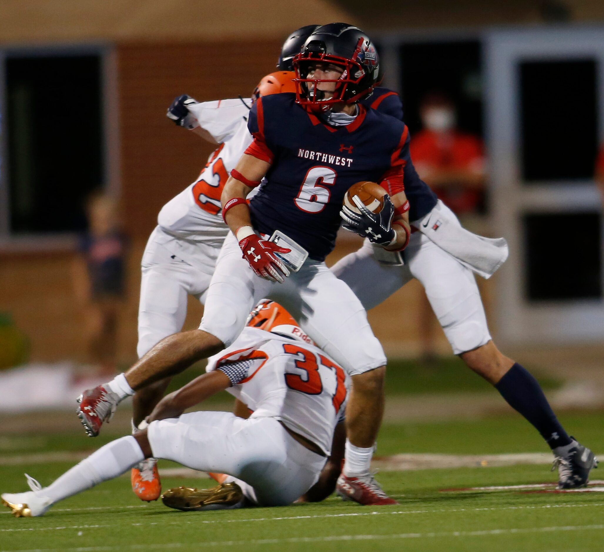 Northwest receiver Weldon Sherrell (6) looks for running room after pulling in a reception...