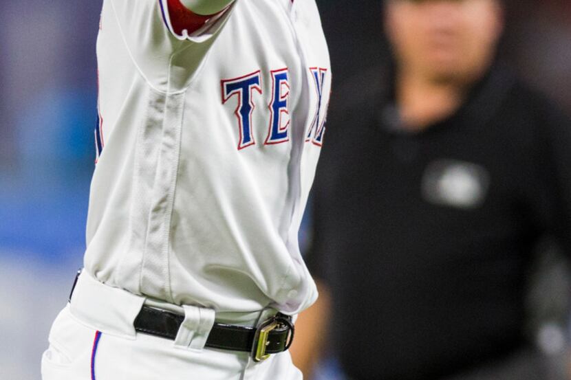 Texas Rangers shortstop Jurickson Profar (19) celebrates a triple play during the fourth...