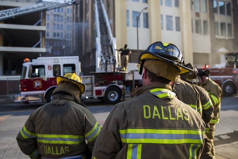 Dallas fire fighters respond to a two alarm fire that originated in a trash chute in 500...