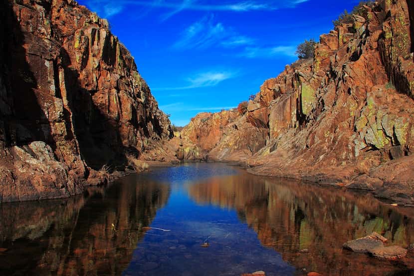 West Cache Creek cuts through the jagged cliffs of the Wichita Mountains Wildlife Refuge....